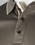 Taupe-brown polo collar and placket with dark buttons and striped inner trim