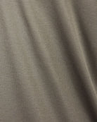 Taupe-brown cotton interlock fabric close-up