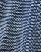 Blue knit fabric with diagonal stripes and a light vertical band detail