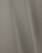 Grey knit-effect T-shirt fabric texture close-up