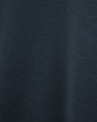 Dark blue jersey T-shirt fabric texture close-up