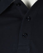 Dark blue pique polo buttoned placket with three dark buttons
