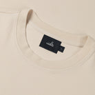 Winter white jersey stretch t-shirt neckline with black brand label tag