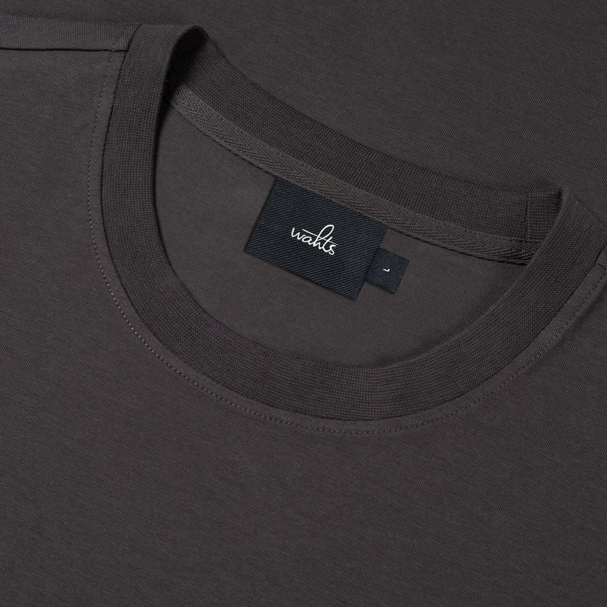 Stretch jersey t-shirt neckline close-up with inner brand label