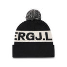 Black knit beanie with pom-pom and white logo band lettering