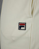Logo patch on pale gardenia pin tuck shorts leg, embroidered F design