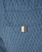 Navy swim shorts waistband with interior label tag