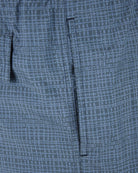 Navy micro-print swim shorts close-up of drawcord and vertical pocket opening