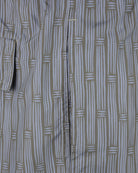 Patterned swim short close-up showing center seam and edge stitching