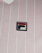 Fila logo patch on pale lilac striped polo with white vertical stripes
