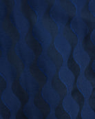 Navy jacquard fabric with repeating zigzag chevron pattern