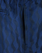 Navy swim short side seam with stitched panel and jacquard texture