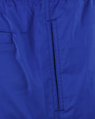 Cobalt blue swim short front with stitched vertical pocket opening