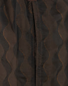 Swim shorts close-up of inner panel seam with contrasting stitching