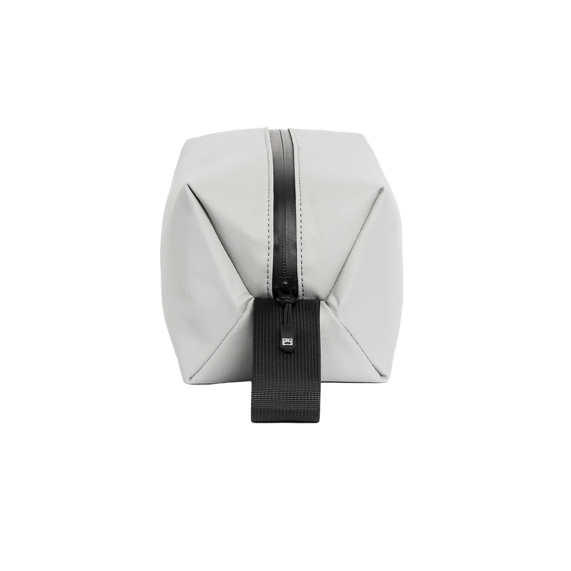 Waterproof wash bag end view in light gray with front strap and zip seam