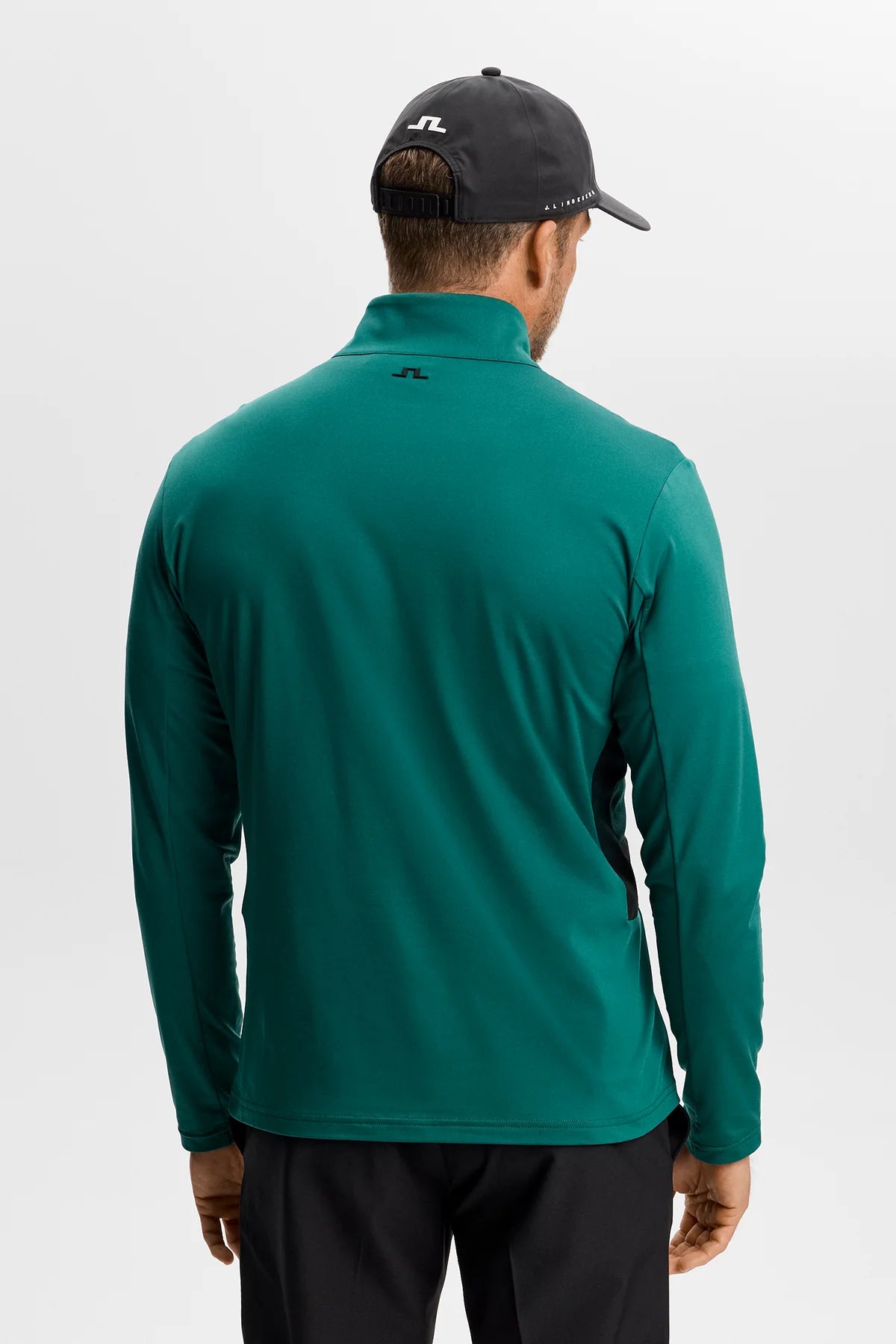 Men's teal quarter-zip mid layer with logo at back collar