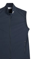 Navy sleeveless vest with full front zipper, side pocket, and high collar