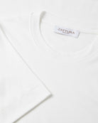 White high-neck T-shirt neckline with ZATURA brand label and short sleeves