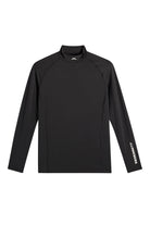 Black long-sleeve compression mock-neck top with sleeve logo, laid flat.
