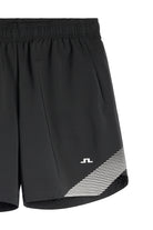 Black shorts with diagonal striped hem panel and small JL logo at side