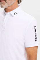White J.Lindeberg Tour Tech polo collar with button placket and sleeve logo
