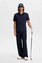 Men's navy J.Lindeberg tour tech polo with front placket and sleeve logos