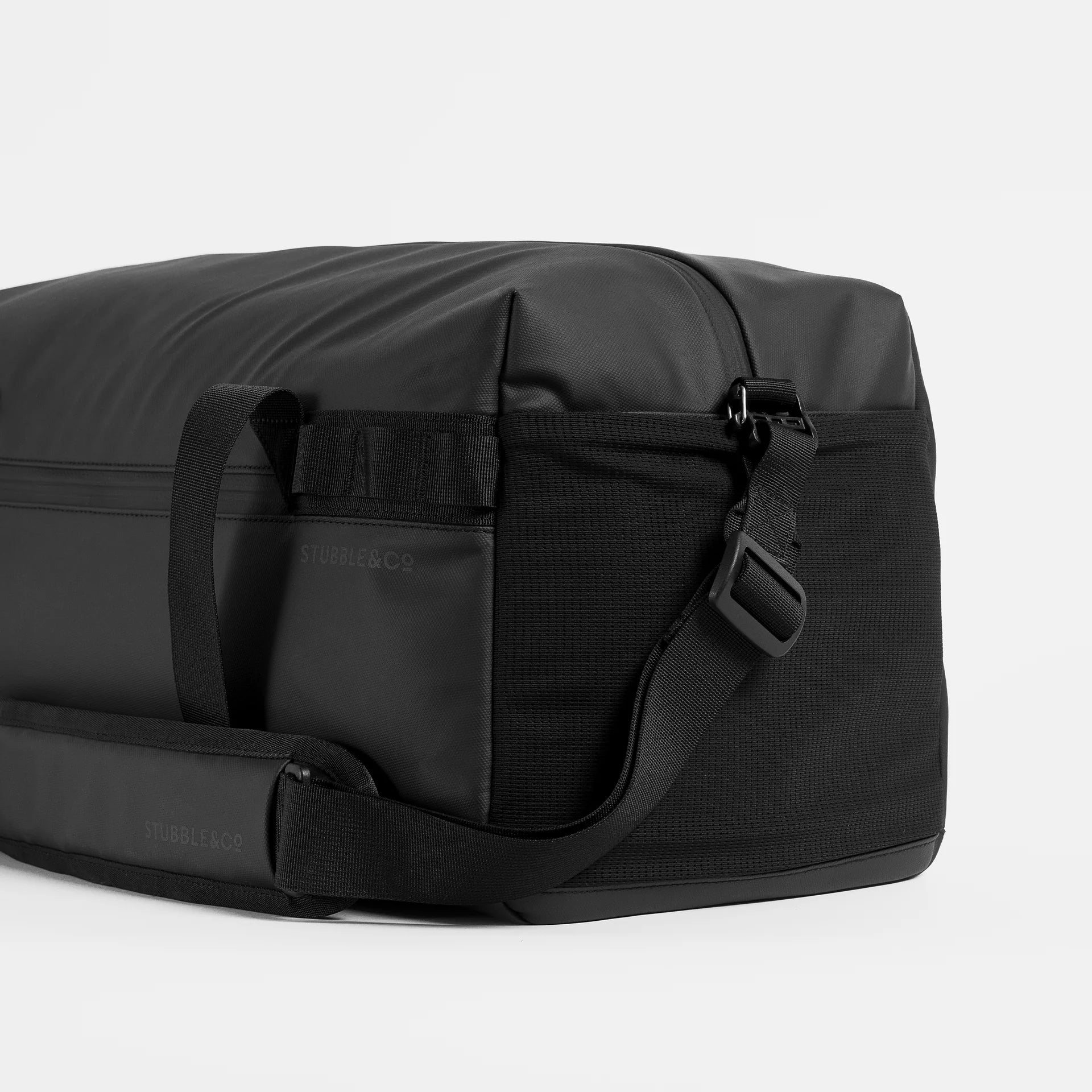 Stubble & Co gym duffel bag with side pocket panel and adjustable strap, black