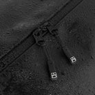 Stubble & Co gym duffel bag fabric texture with black zipper pulls, black