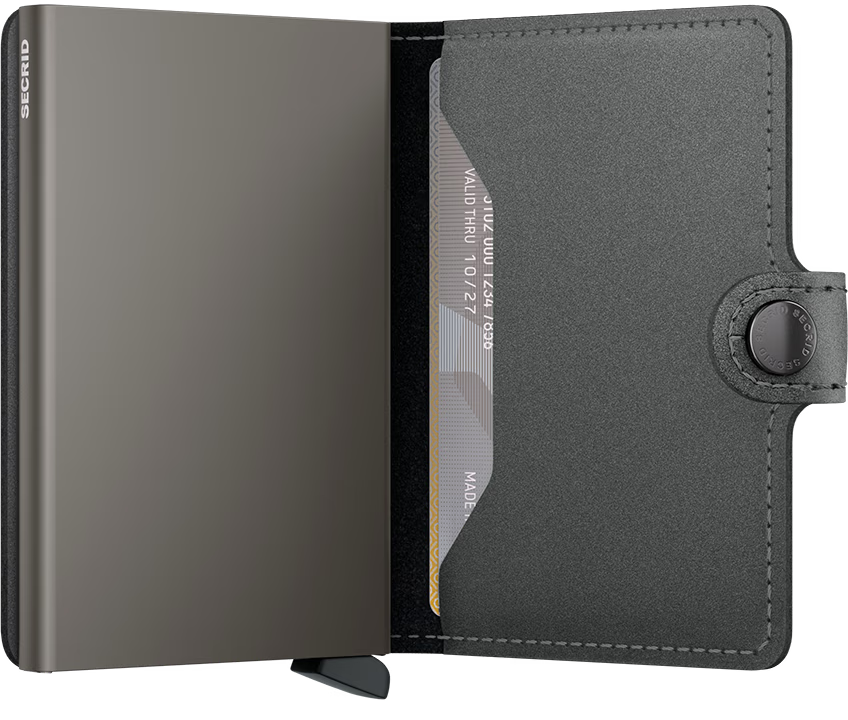Secrid Miniwallet open view in matte satin steel, card area and embossed button