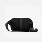 Charcoal sling bag with textured side panels and front webbing strap