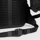 Dark gray waist belt with adjustable webbing and plastic buckle on the backpack