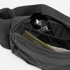 Charcoal waste pack interior with elastic pocket and divider section