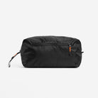 Black weatherproof shoe bag with orange-accent zip and carry loops.