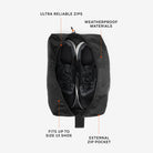 Open weatherproof shoe bag holding two sneakers, exterior zip pocket.